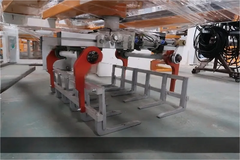 High level Palletiser - claw