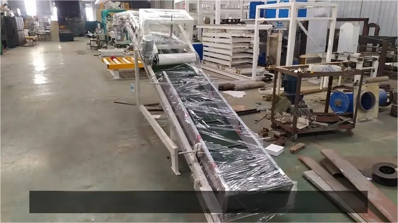 High level Palletiser - conveyor roller