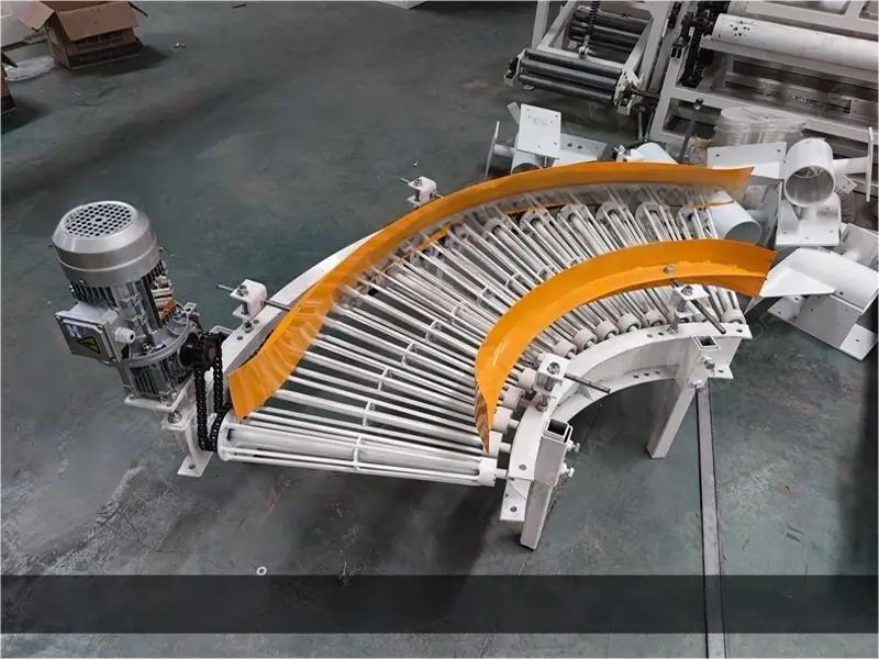 High level Palletiser - corner rollers