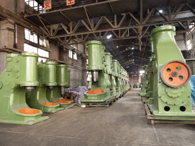 power_hammers_industrial_machine_hall_with_green_presses